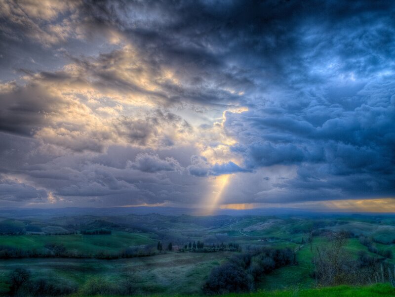Sunlight Through Storm Clouds — Blue, Dramatic, Sunrise, Photograph, Hills