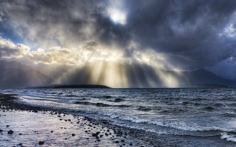 Sunlight Through Storm Clouds — Blue, Dramatic, Sunrise