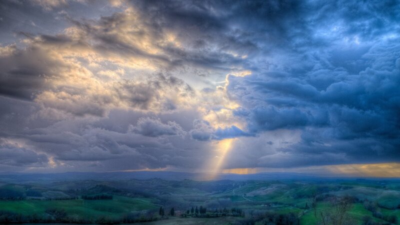 Sunlight Through Storm Clouds — Blue, Dramatic, Sunset, Photograph, Hills