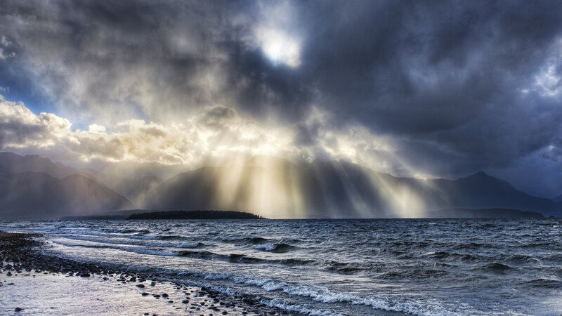 Sunlight Through Storm Clouds — Blue, Dramatic, Sunset, Photograph, Mountains