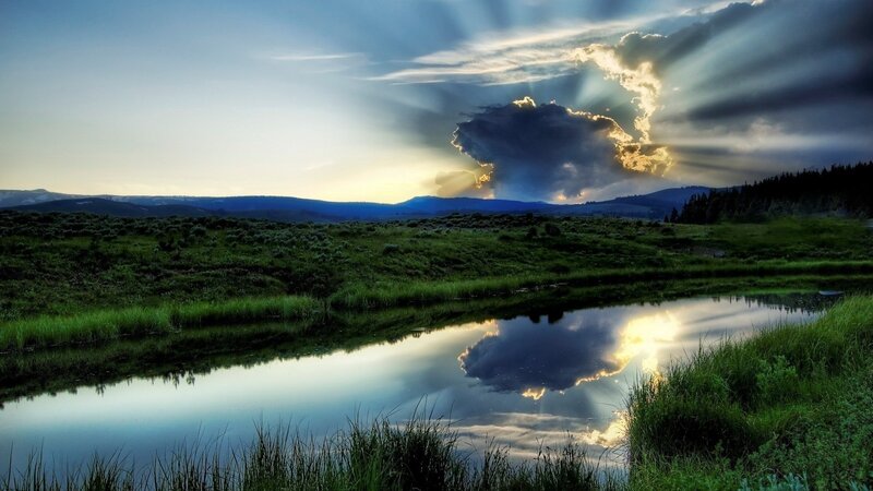 Sunlight Through Storm Clouds — Blue, Dramatic, Sunset, Photograph, River, Grass