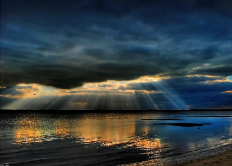 Sunlight Through Storm Clouds — Blue, Dramatic, Sunset