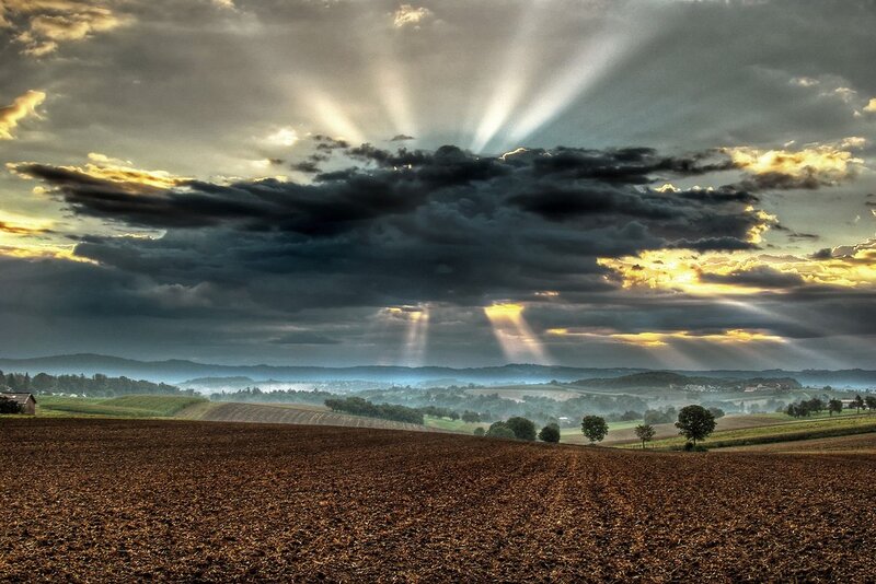 Sunlight Through Storm Clouds — Brown, Dramatic, Sunset