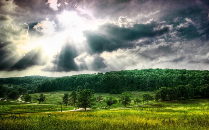Sunlight Through Storm Clouds — Dramatic