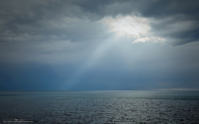 Sunlight Through Storm Clouds — Gray, Dramatic, Photograph