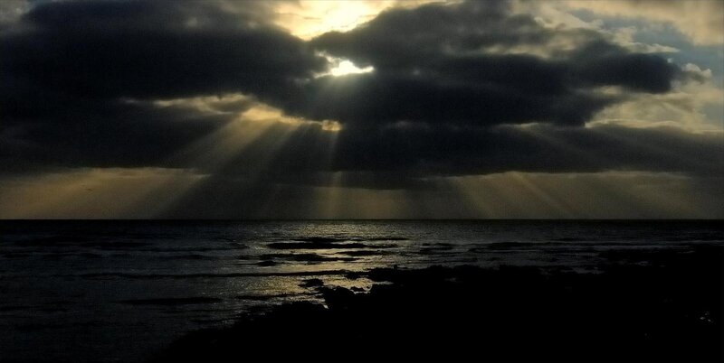 Sunlight Through Storm Clouds — Gray, Dramatic, Sunrise, Photograph