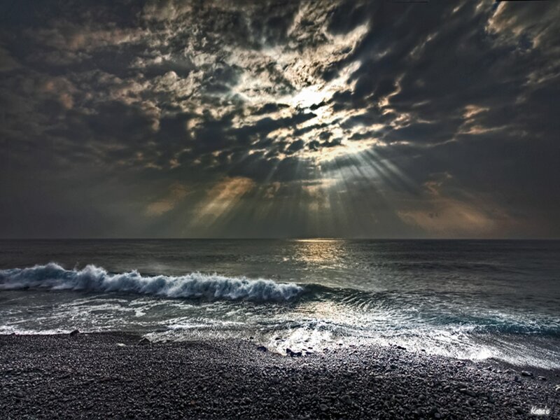 Sunlight Through Storm Clouds — Gray, Dramatic, Sunset, Photograph, Ocean, Waves