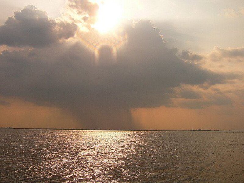 Sunlight Through Storm Clouds — Gray, Dramatic, Sunset, Photograph, Sea