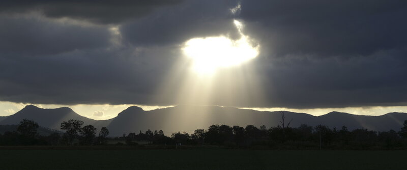 Sunlight Through Storm Clouds — Gray, Dramatic, Sunset, Photograph