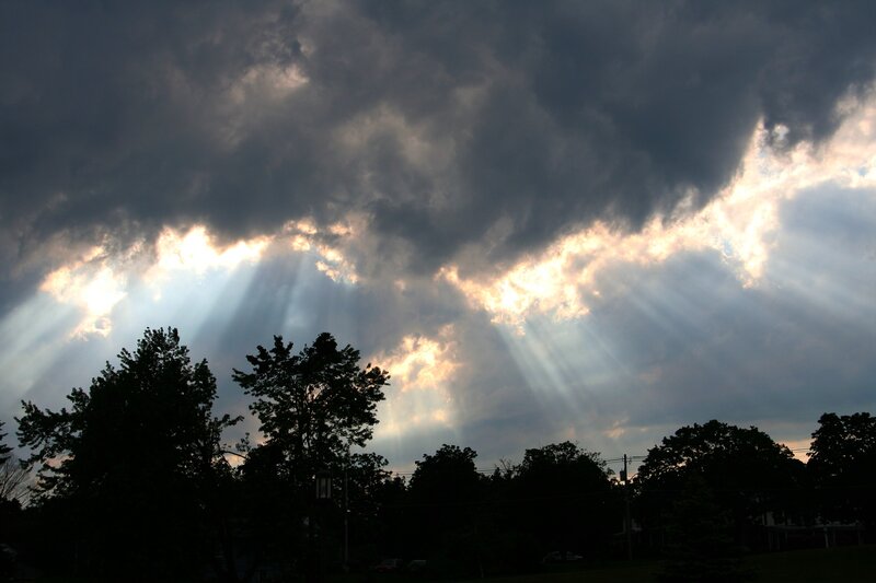 Sunlight Through Storm Clouds — Gray, Dramatic, Sunset