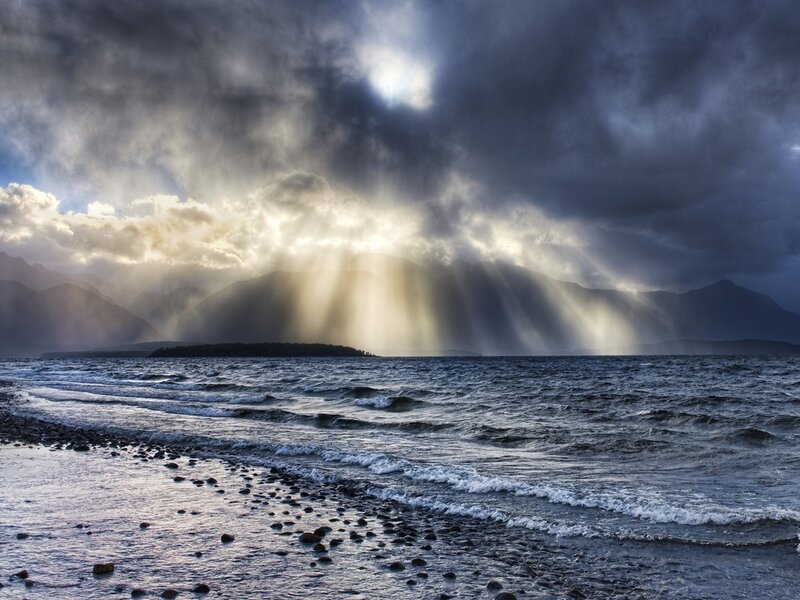 Sunlight Through Storm Clouds — Gray, Dramatic