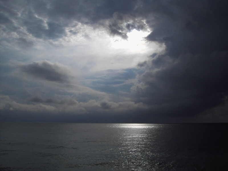 Sunlight Through Storm Clouds — Gray