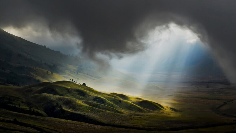Sunlight Through Storm Clouds — Green, Dramatic, Morning
