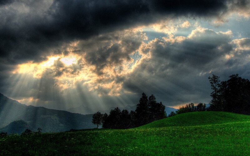 Sunlight Through Storm Clouds — Green, Dramatic, Sunset, Photograph, Mountains, Trees