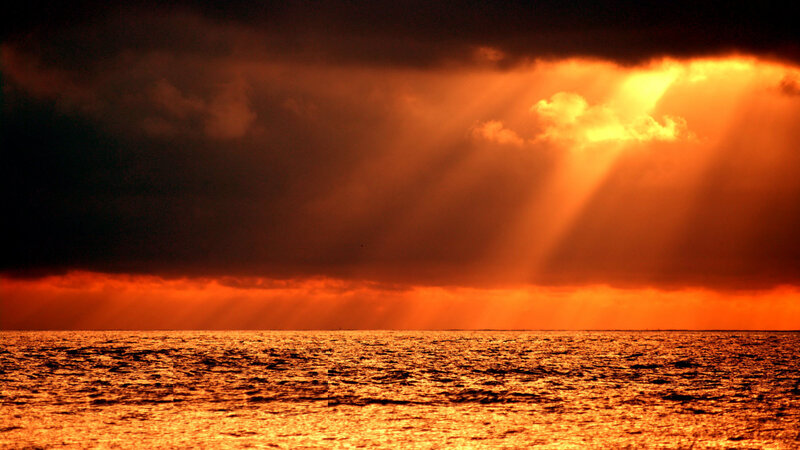 Sunlight Through Storm Clouds — Orange