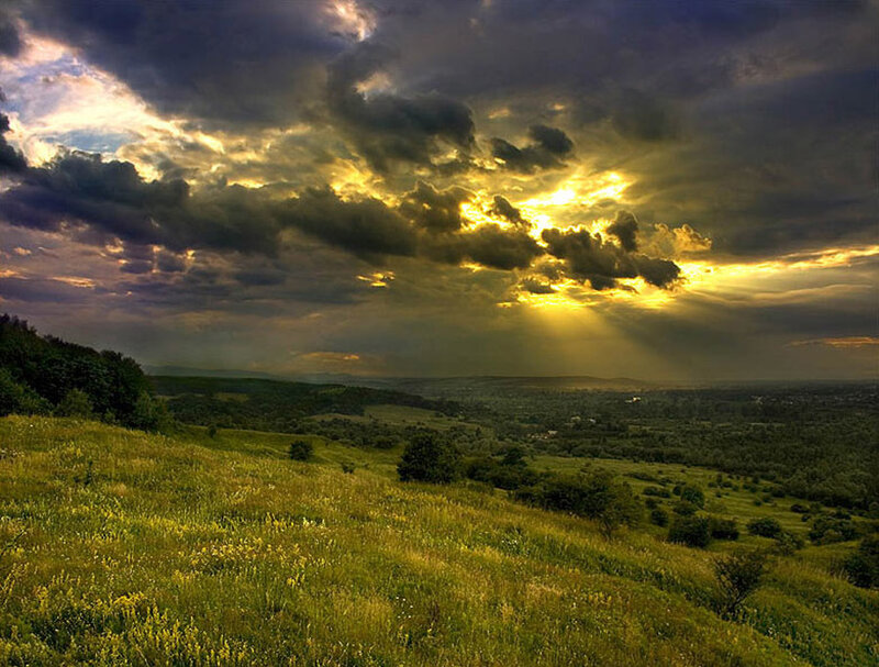 Sunlight Through Storm Clouds — Yellow, Dramatic, Sunset, Photograph, Hills