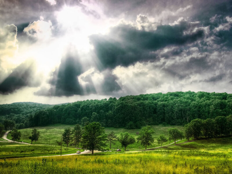 Sunlight through stormy clouds