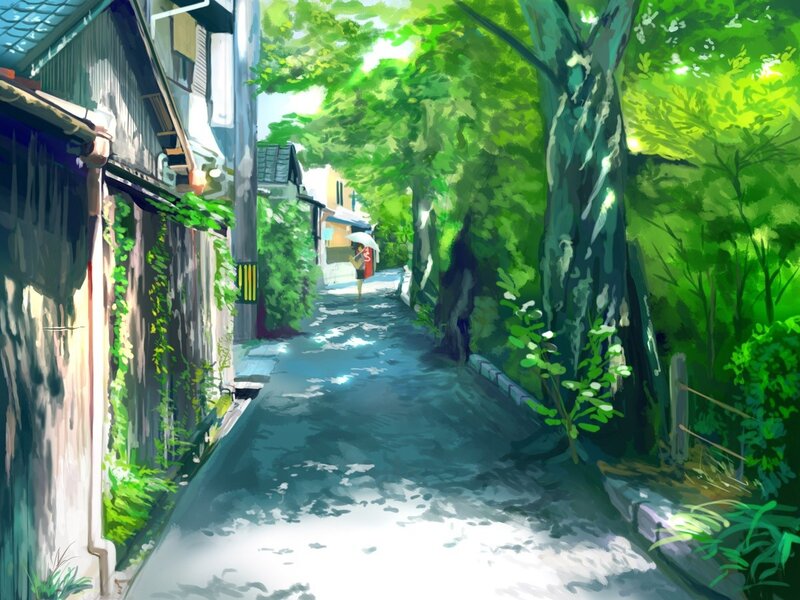 Sunlit alley with green trees