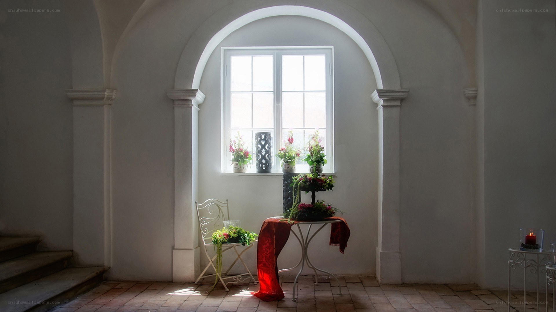 Sunlit arched alcove with flowers
