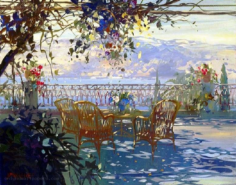 Sunlit balcony with wicker chairs