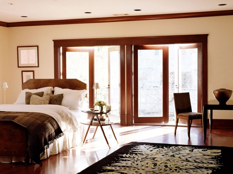 Sunlit bedroom with wooden accents