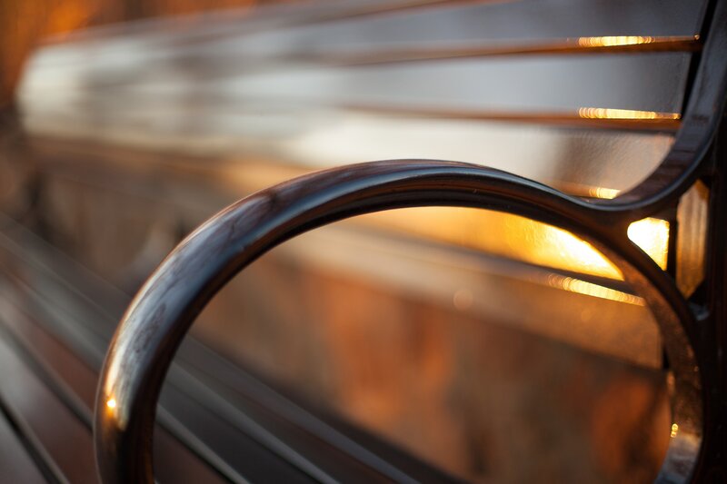 Sunlit bench armrest