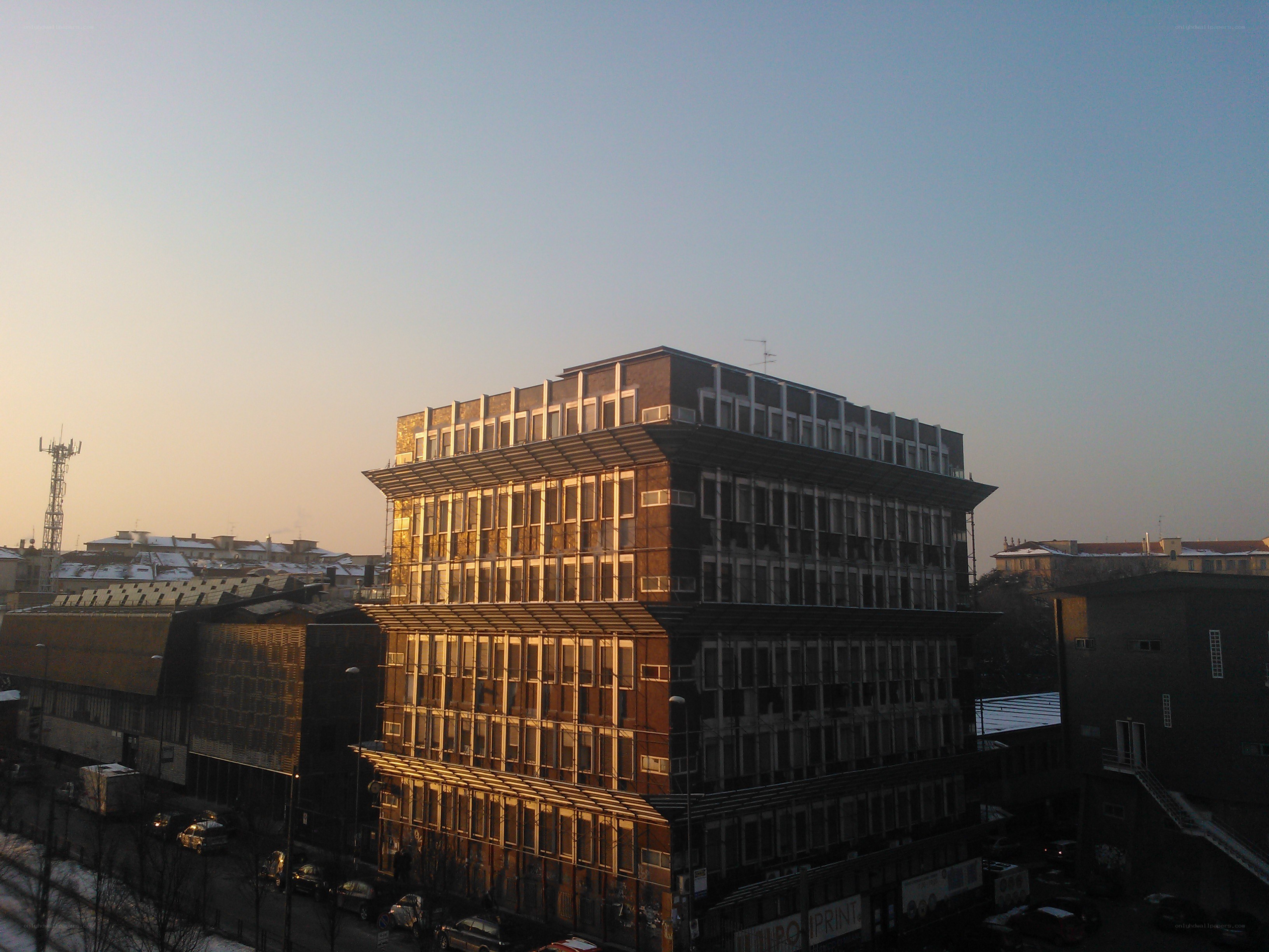 Sunlit building at dusk