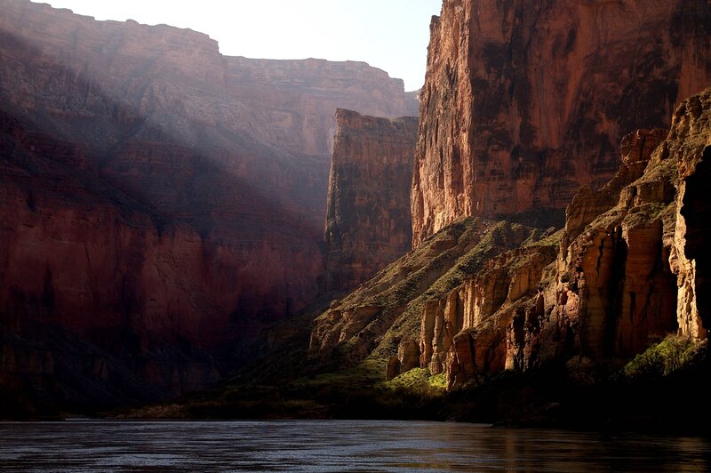Sunlit canyon with river