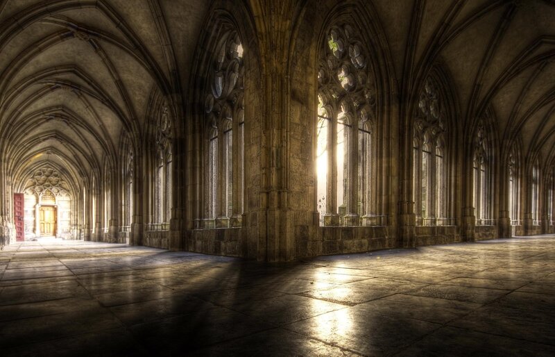 Sunlit cathedral corridor