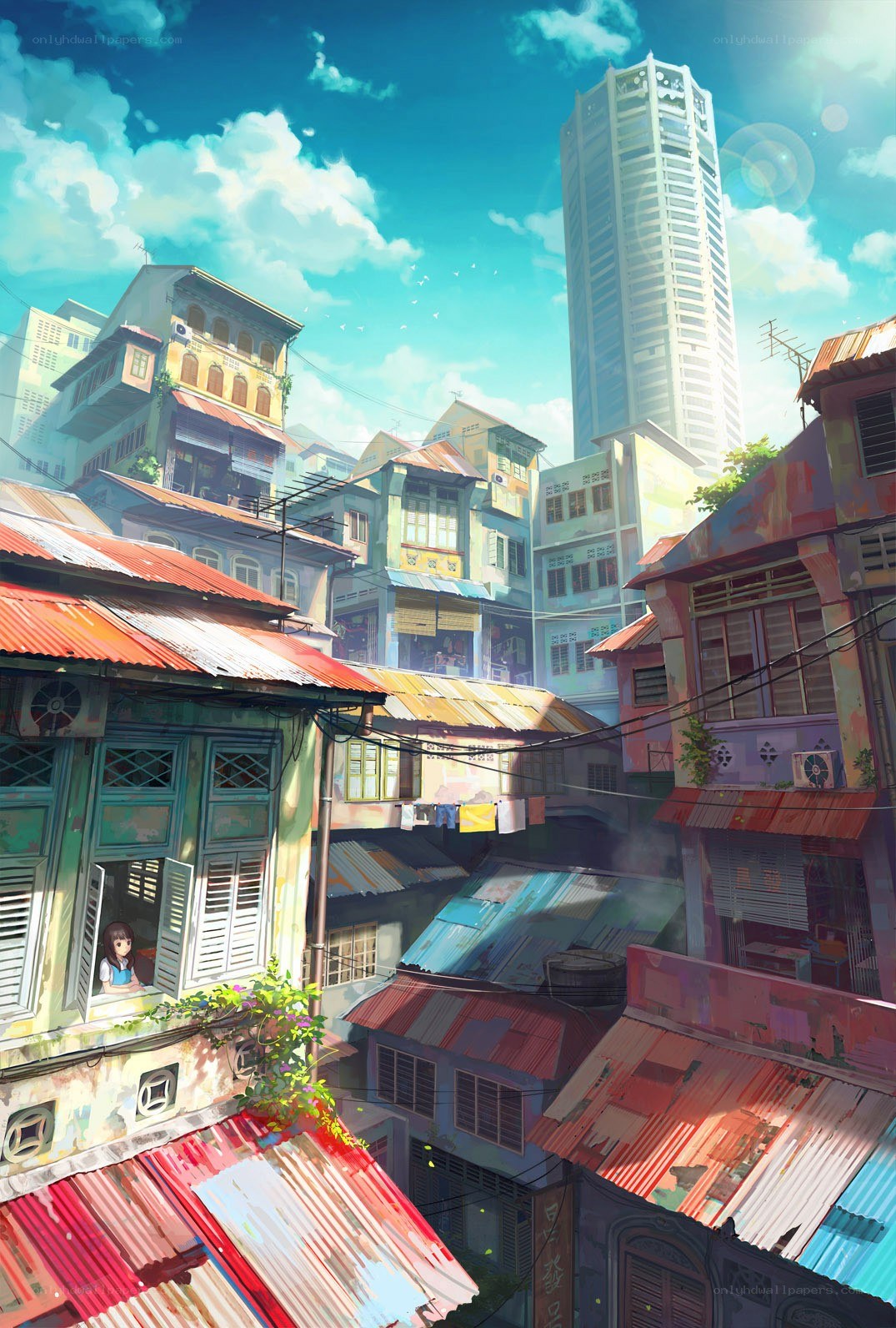 Sunlit city with a skyscraper