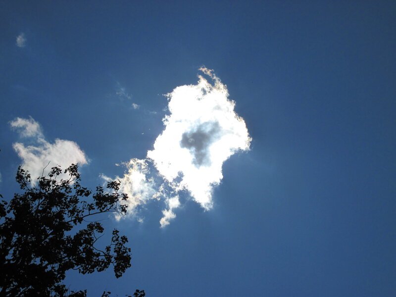 Sunlit Cloud in Blue Sky
