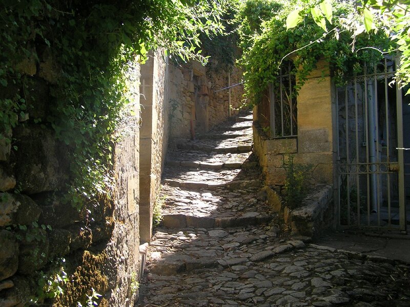 Sunlit cobblestone alley