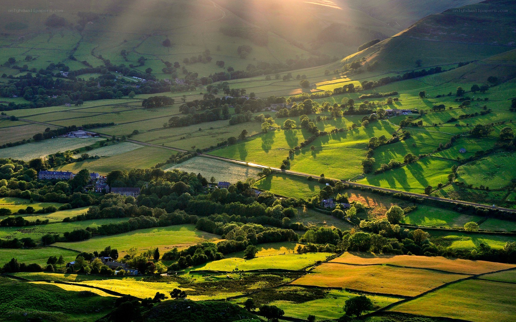 Sunlit green valley landscape