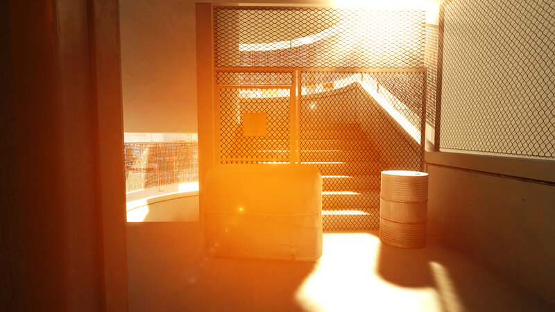 Sunlit industrial corridor
