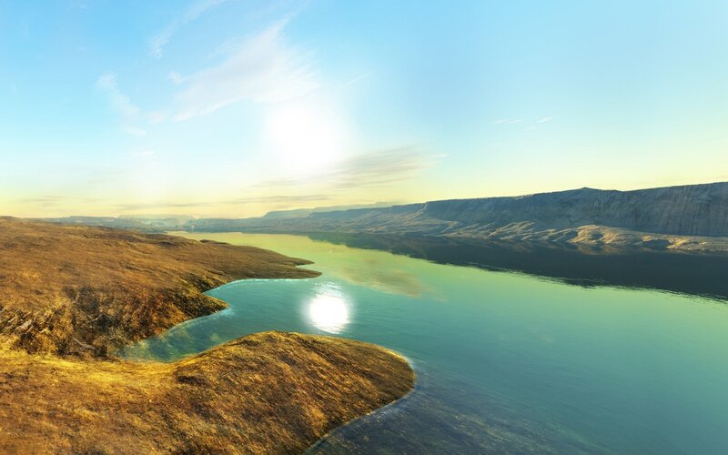 Sunlit lake in canyon landscape