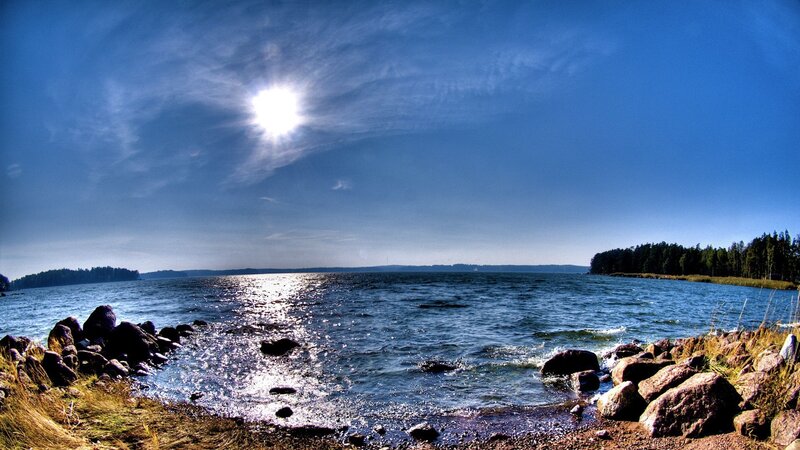 Sunlit Lake with Rocks