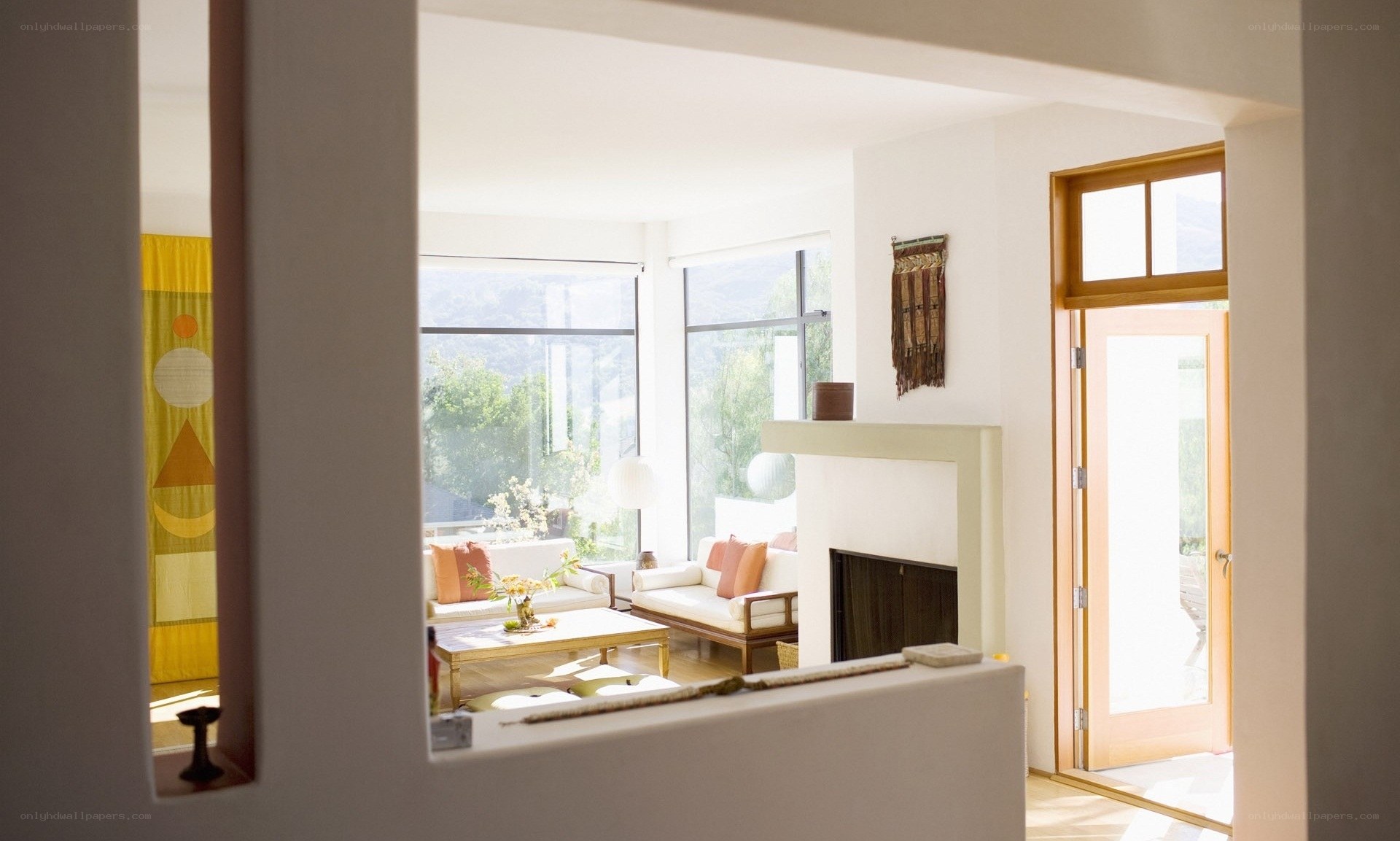 Sunlit living room with fireplace