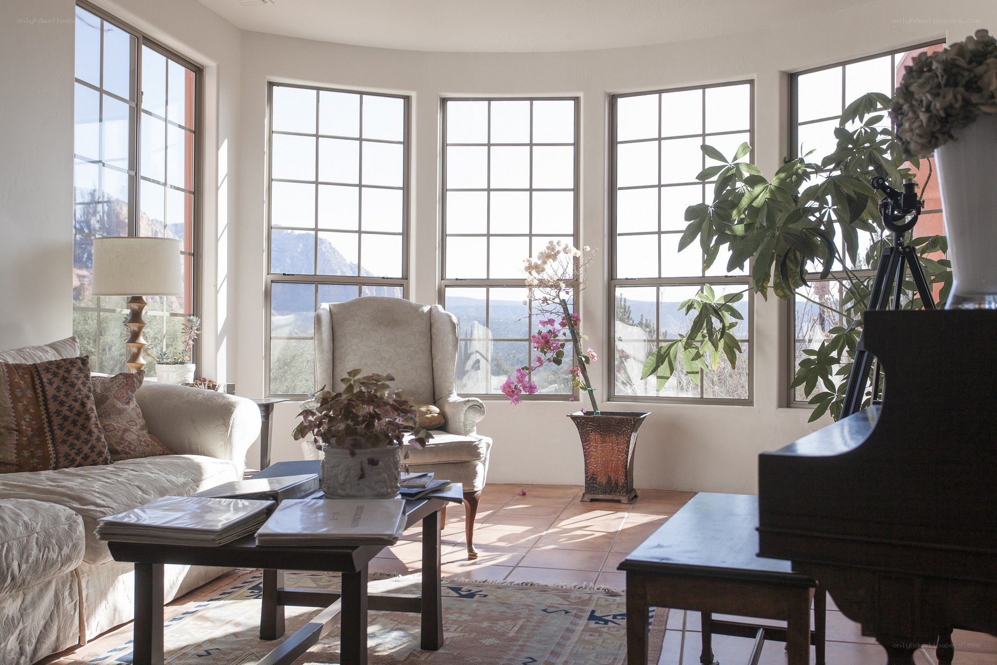 Sunlit living room with piano