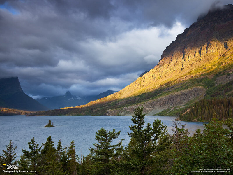 Sunlit mountain lake landscape