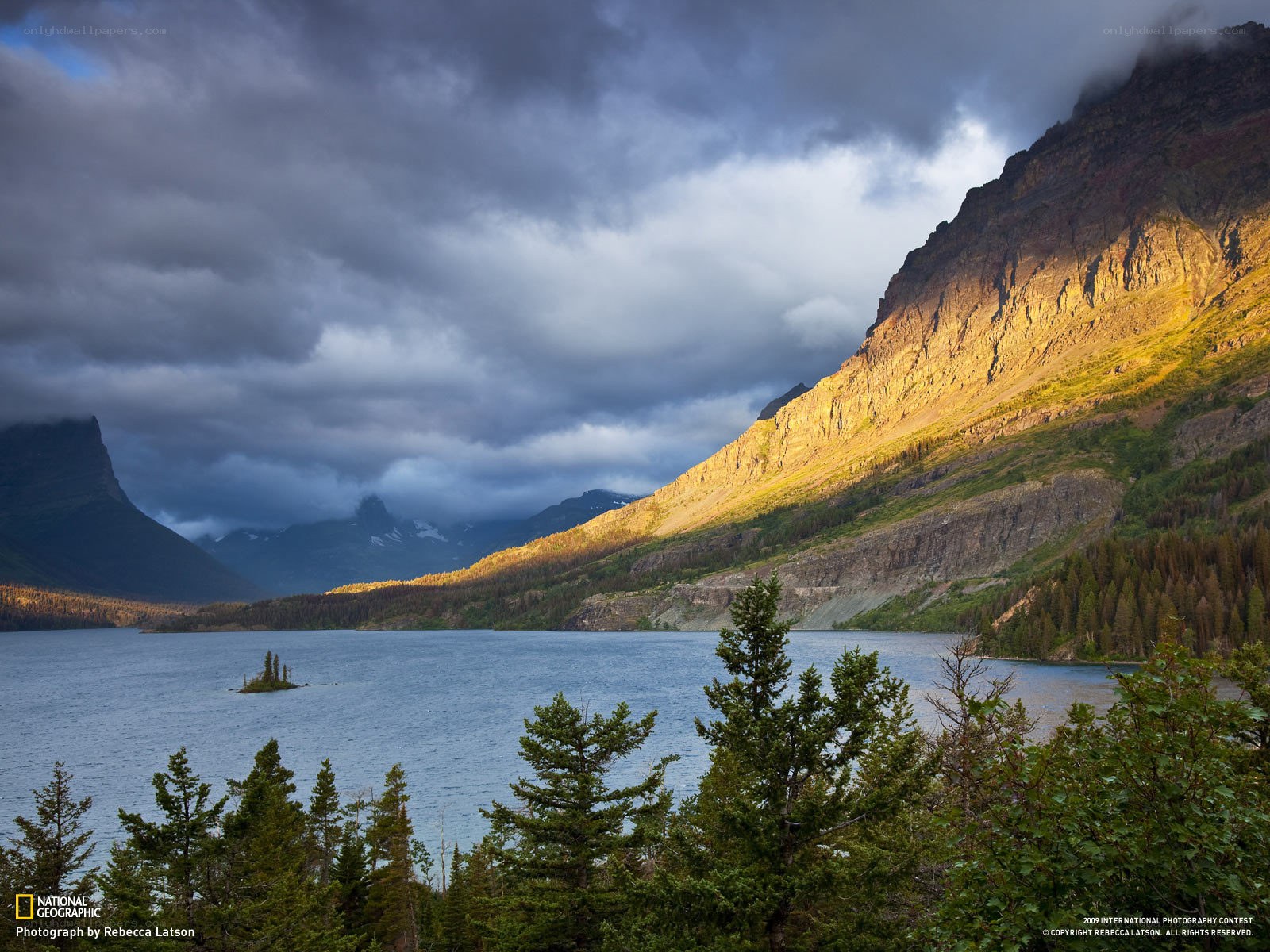 Sunlit mountain lake landscape