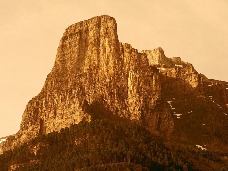 Sunlit mountain peak