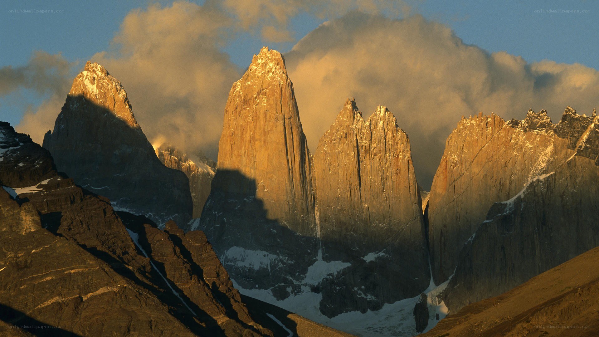 Sunlit mountain peaks at dawn