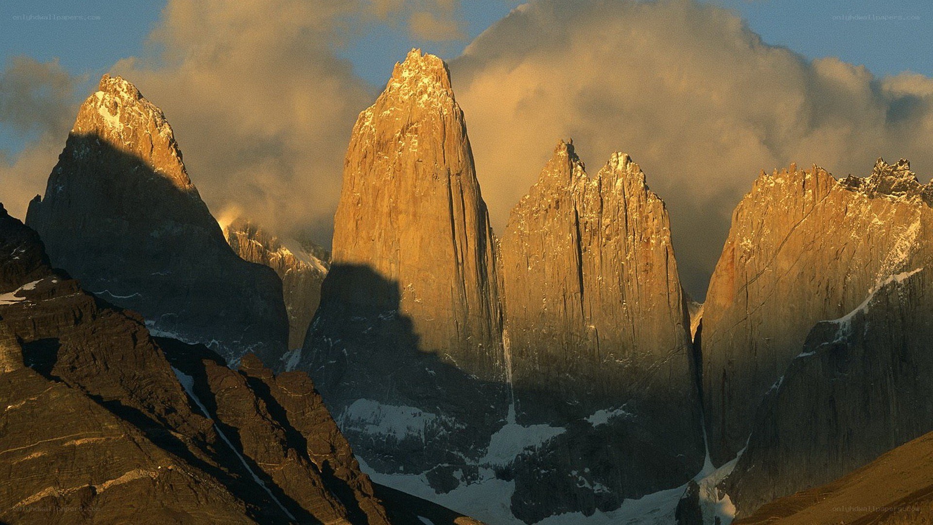 Sunlit mountain peaks at dawn