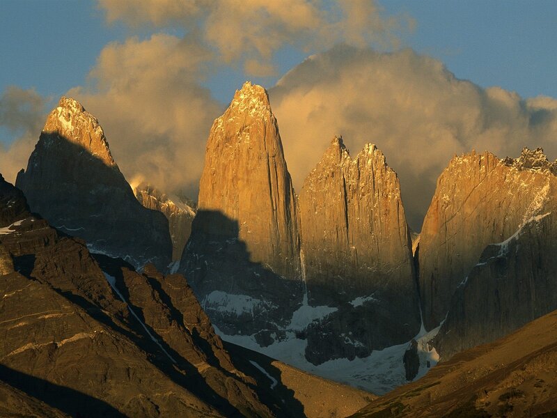 Sunlit mountain peaks at dawn