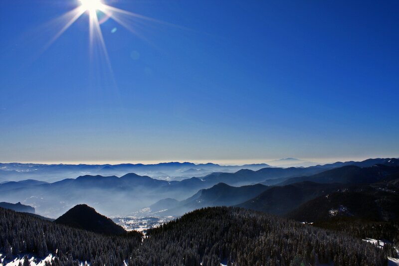 Sunlit mountain range view