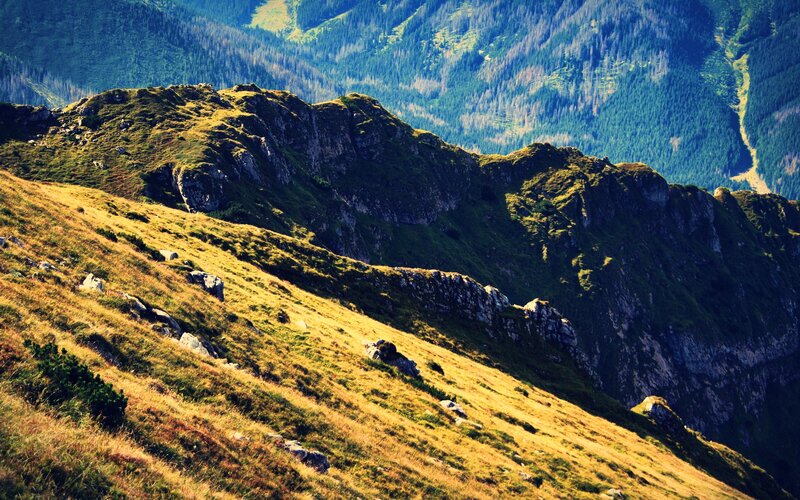 Sunlit mountain ridge landscape