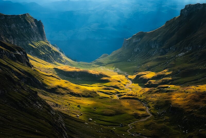 Sunlit mountain valley
