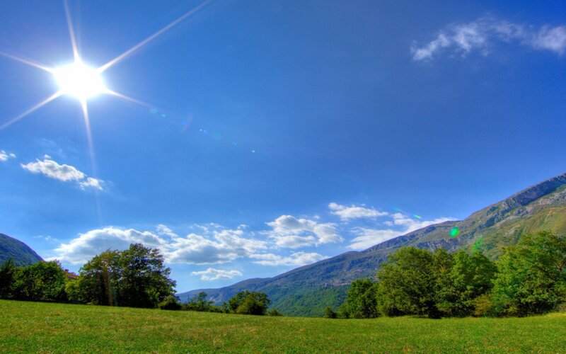Sunlit Mountain Valley — Blue