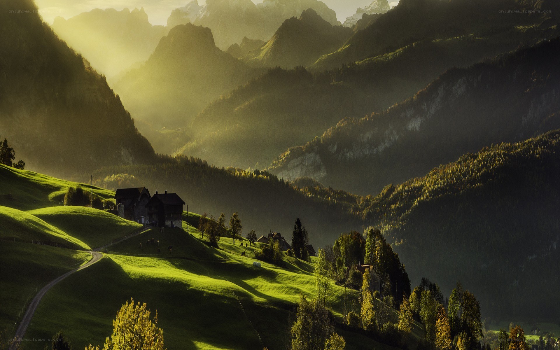 Sunlit mountain village at dawn