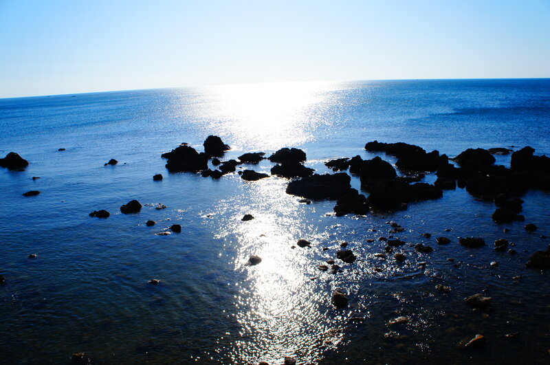 Sunlit Ocean Rocks